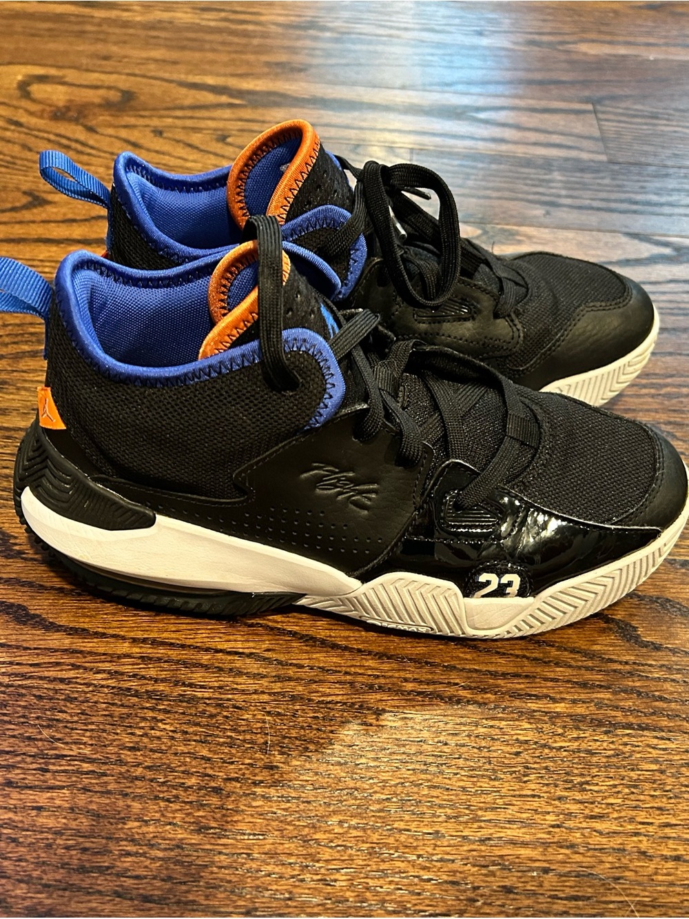 Jordan Kids Black Sneakers with Blue & Orange Accents